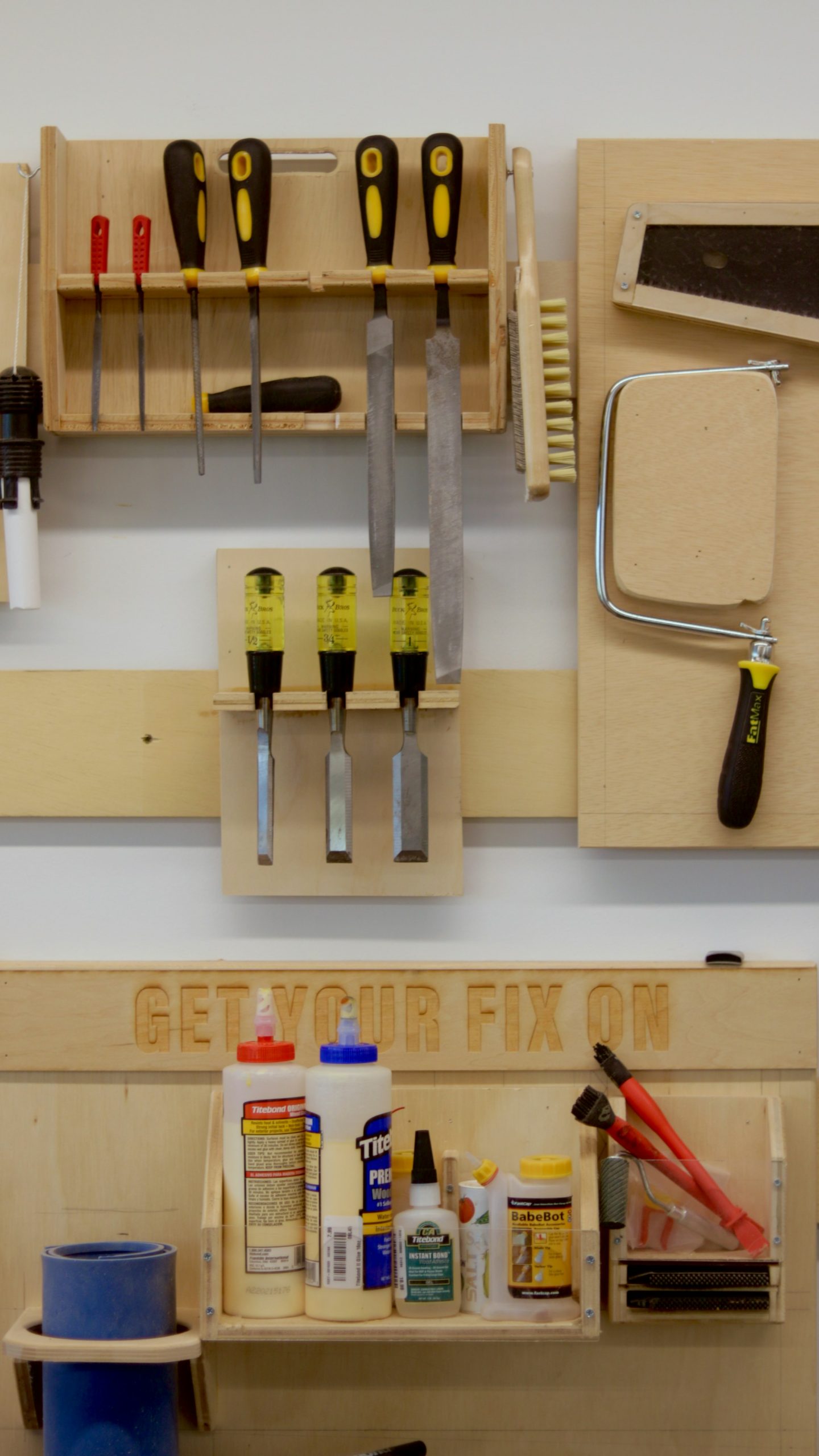 Woodworking workbench with hand tools and power tools used for joinery and cabinet work